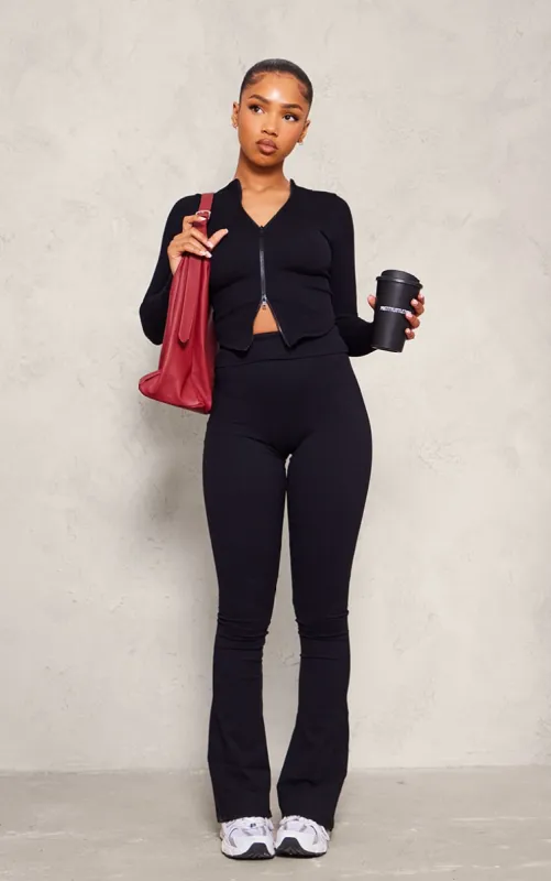 Black Contour Rib Double Zip Top sold by Pretty Little Thing
