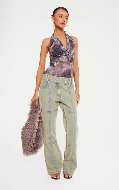 Petite Indigo Vintage Wash Seam Detail Flared Jeans sold by Pretty Little Thing