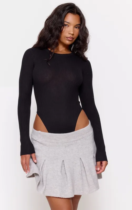 Black Ribbed Knit Long Sleeve Bodysuit sold by Pretty Little Thing