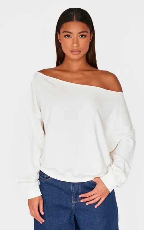 Cream Oversized Off Shoulder Sweatshirt sold by Pretty Little Thing