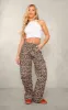White Slinky Racer Crop Top, White sold by Pretty Little Thing