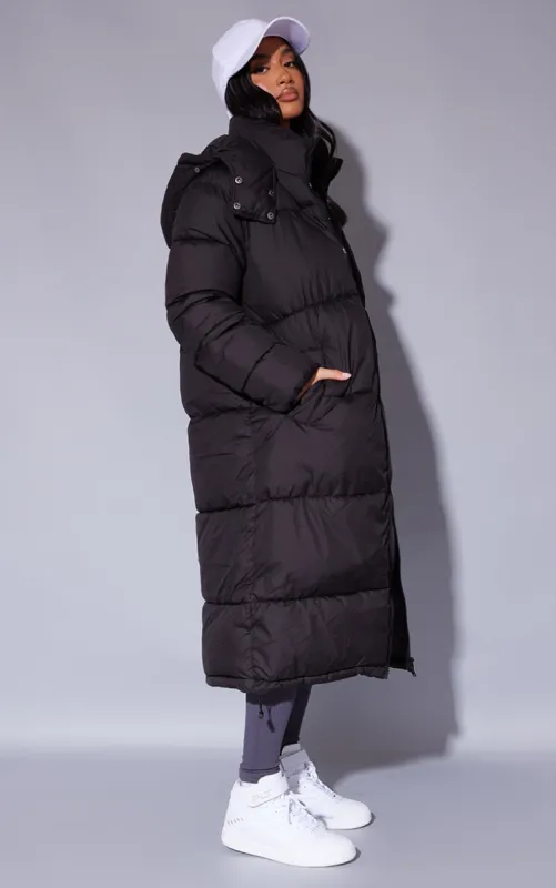 Petite Black Longline Puffer Coat sold by Pretty Little Thing