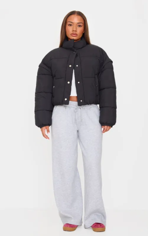 Petite Black Soft Nylon Set In Sleeve Popper Pocket Puffer Jacket sold by Pretty Little Thing