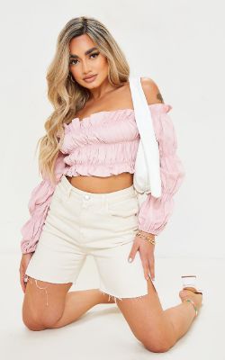 Petite Pink Ruched Long Sleeve Cropped Blouse sold by Pretty Little Thing