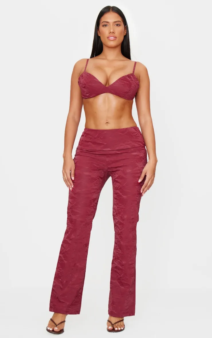 Shape Burgundy Washed Faux Leather Panel Detail Trousers sold by Pretty Little Thing