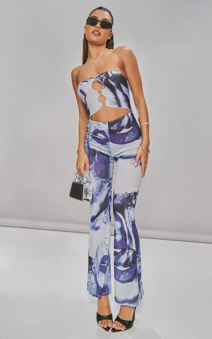 Blue Printed Ring Detail Burn Out Mesh Flared Jumpsuit sold by Pretty Little Thing