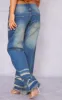 Petite Mid Blue Wash Low Rise Lace Up Wide Leg Jeans sold by Pretty Little Thing