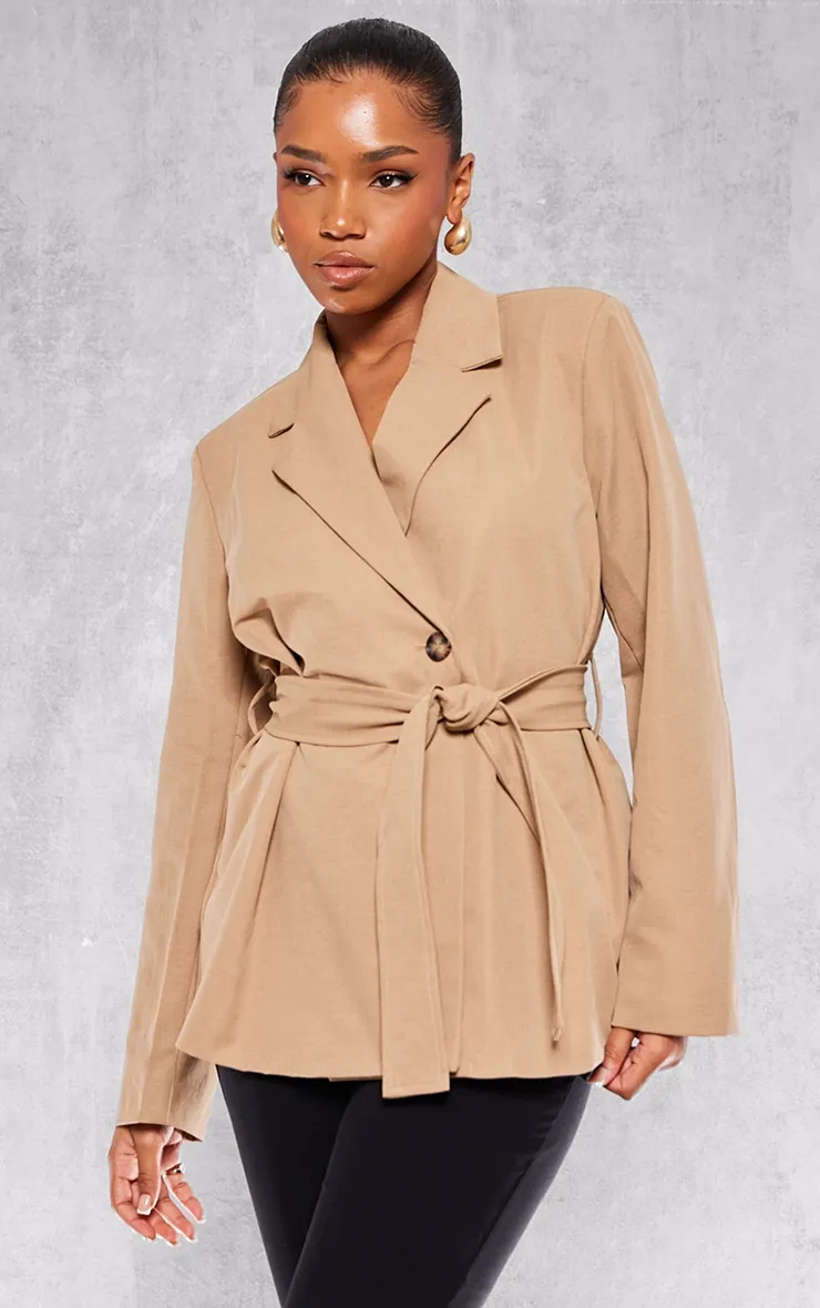 Sand Wide Belted Waist Blazer sold by Pretty Little Thing