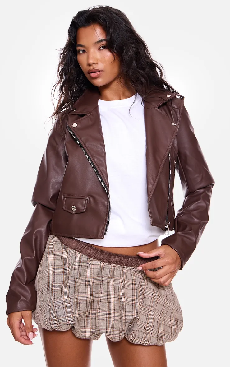 Chocolate Basic Faux Leather Biker Jacket sold by Pretty Little Thing