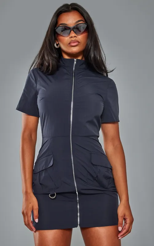 Navy Parachute Cargo Zip Through Shirt Dress sold by Pretty Little Thing