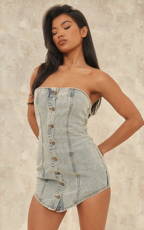 Vintage Wash Curved Hem Button Through Denim Mini Dress sold by Pretty Little Thing