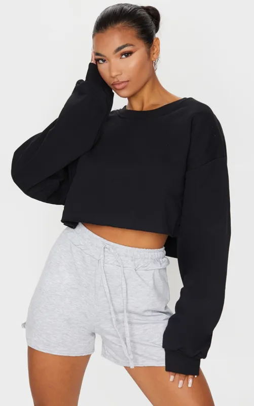 Black Oversized Cropped Sweat Shirt sold by Pretty Little Thing