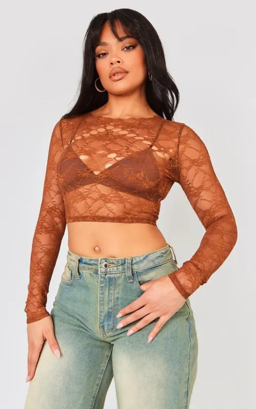 Brown Lace Cut Out Long Sleeve Top sold by Pretty Little Thing