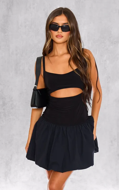 Black Underbust Cut Out Puffball Mini Dress sold by Pretty Little Thing
