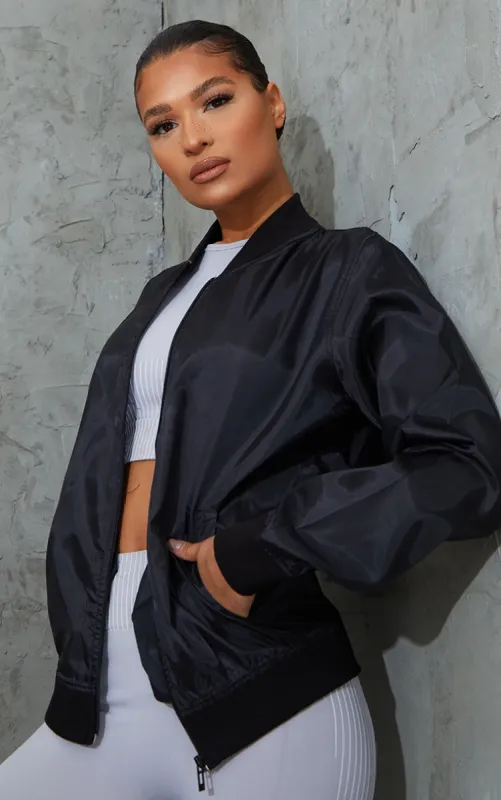 Black Basic Lightweight Bomber Jacket sold by Pretty Little Thing
