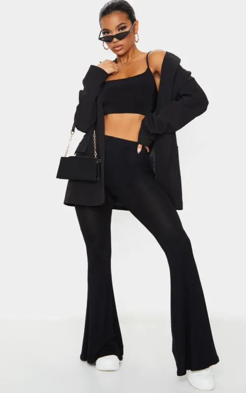 Basic Black Jersey Flared Trousers sold by Pretty Little Thing