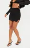 Black Split Mini Skirt sold by Pretty Little Thing