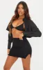 Black Split Mini Skirt sold by Pretty Little Thing