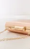Rose Gold Metallic Clutch sold by Pretty Little Thing