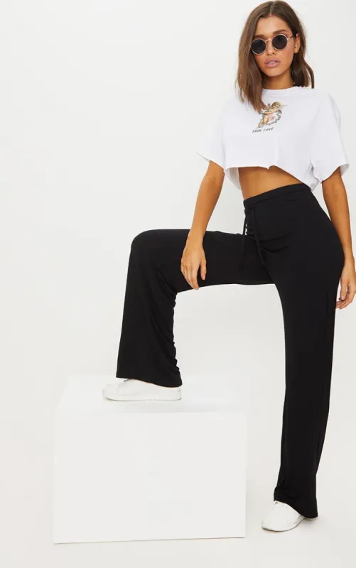 Black Drawstring Jersey Wide Leg Trousers sold by Pretty Little Thing