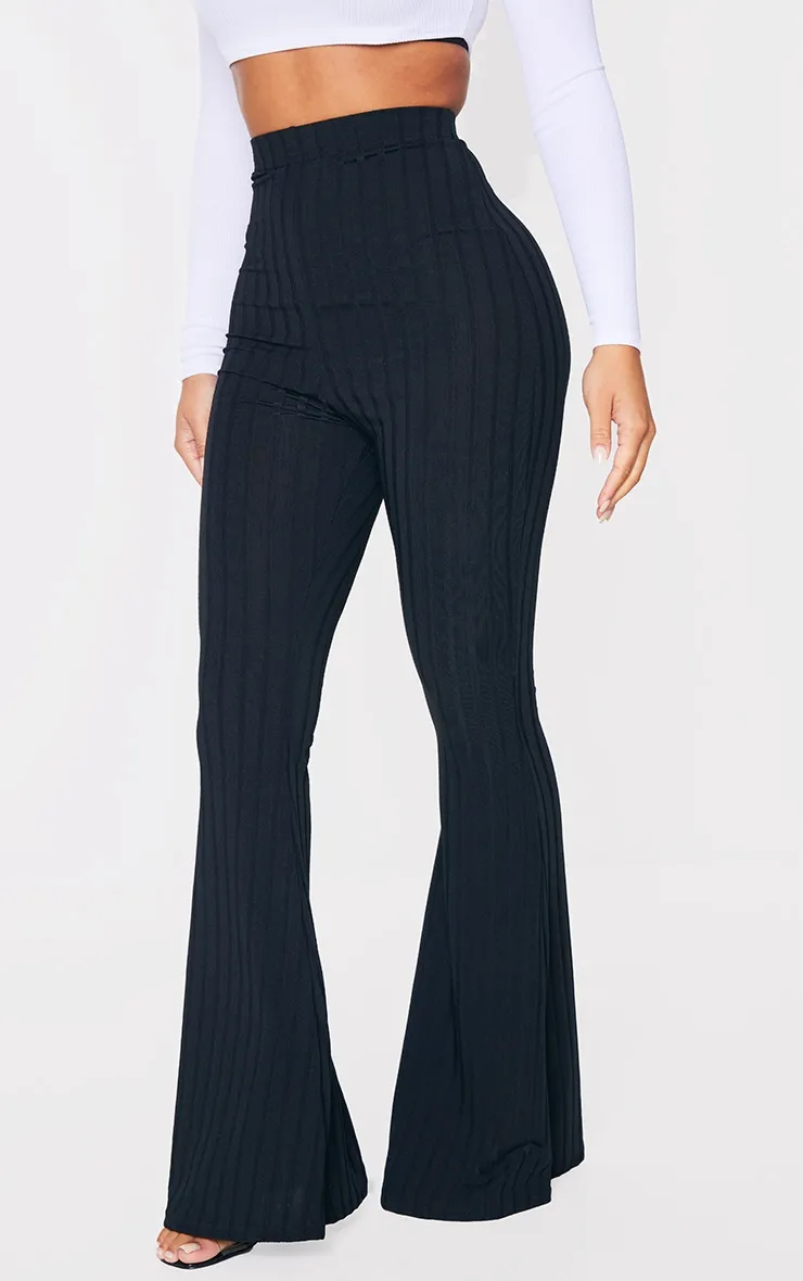 Petite Black Flared Trousers sold by Pretty Little Thing product image thumbnail 2