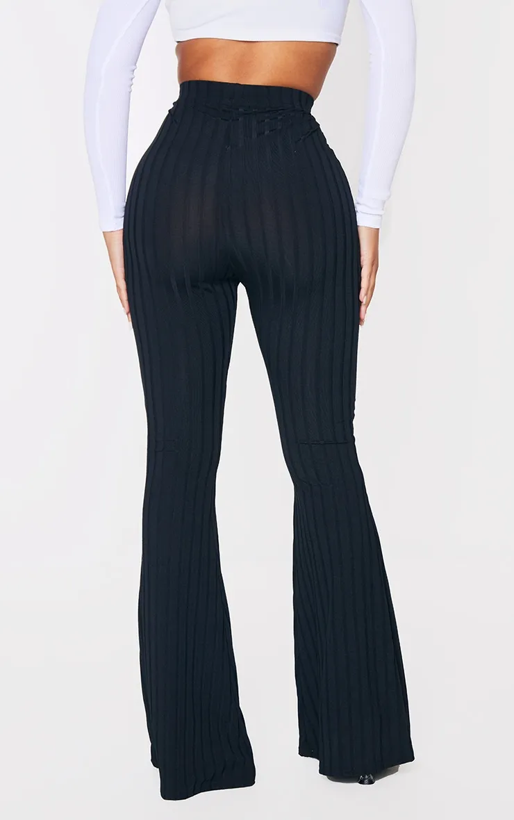 Petite Black Flared Trousers sold by Pretty Little Thing product image thumbnail 3