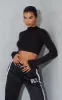 Black High Neck Long Sleeve Crop Top sold by Pretty Little Thing