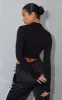 Black High Neck Long Sleeve Crop Top sold by Pretty Little Thing