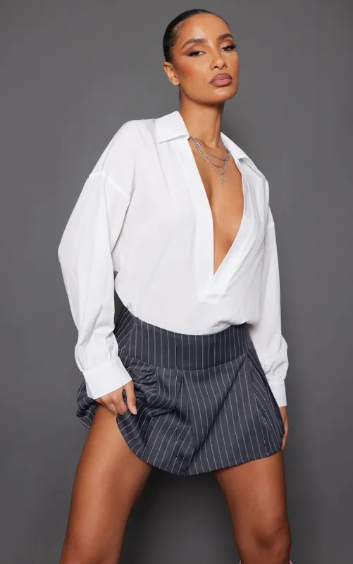 White V Plunge Blouse sold by Pretty Little Thing