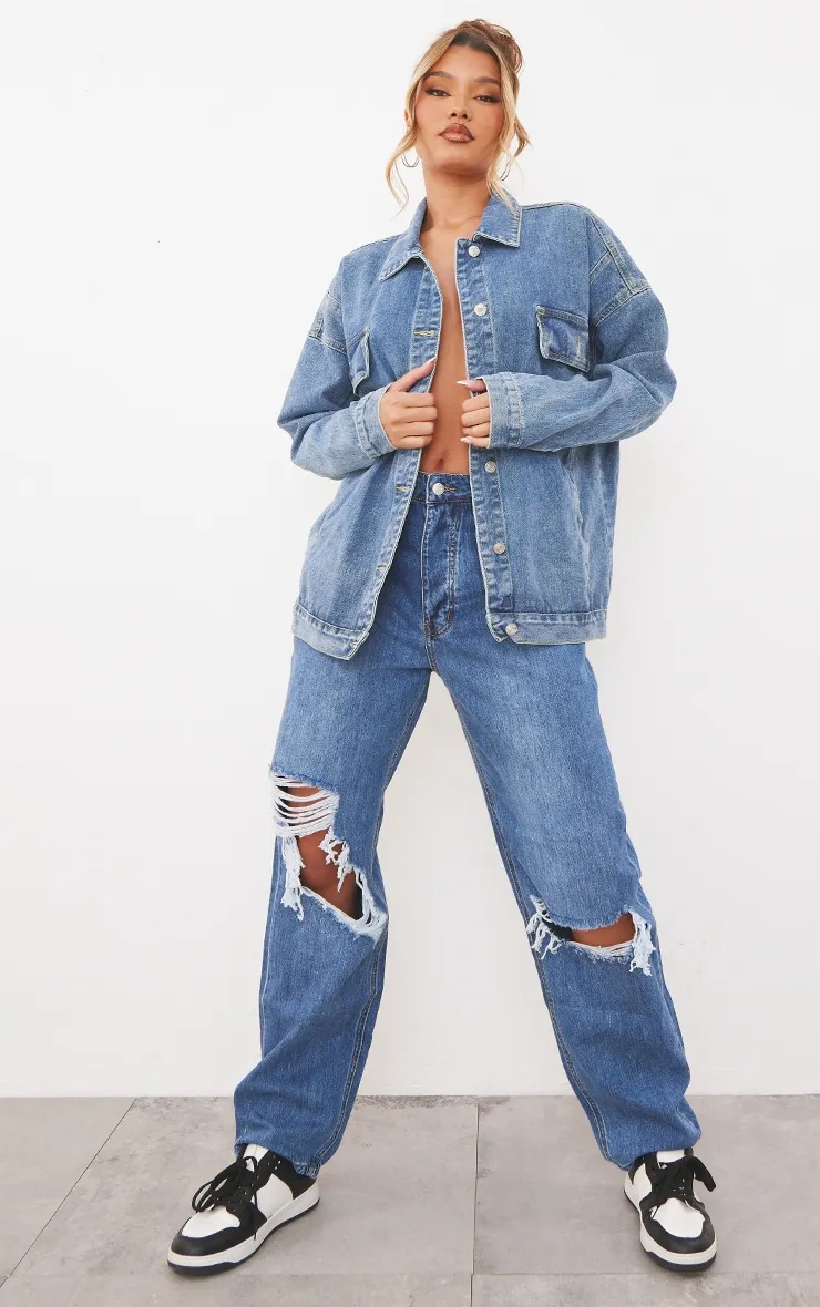 PRETTYLITTLETHING Mid Blue Wash Knee Rip Boyfriend Jeans sold by Pretty Little Thing
