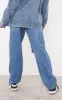 PRETTYLITTLETHING Mid Blue Wash Knee Rip Boyfriend Jeans sold by Pretty Little Thing