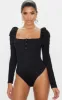 Black Rib Puff Long Sleeve Bodysuit sold by Pretty Little Thing