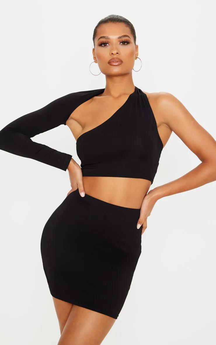 Black Cotton One Shoulder Asymmetric Crop Top sold by Pretty Little Thing