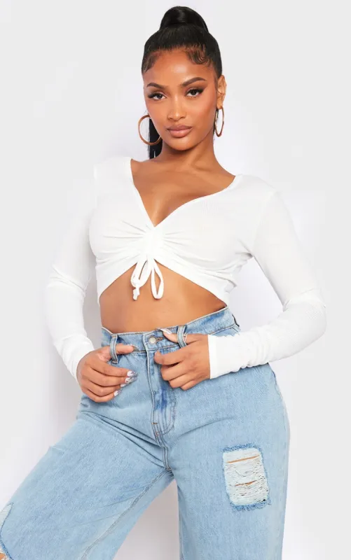 Shape White Ribbed Long Sleeve Ruched Front Crop Top sold by Pretty Little Thing