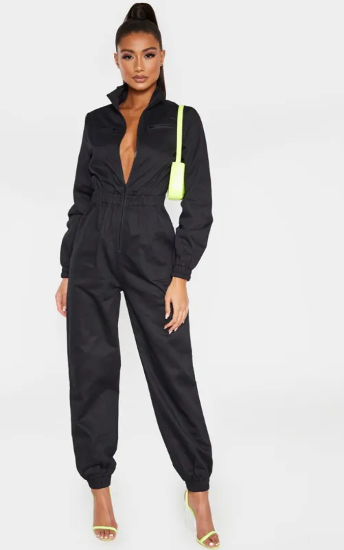 Black Boiler Contrast Zip Jumpsuit sold by Pretty Little Thing