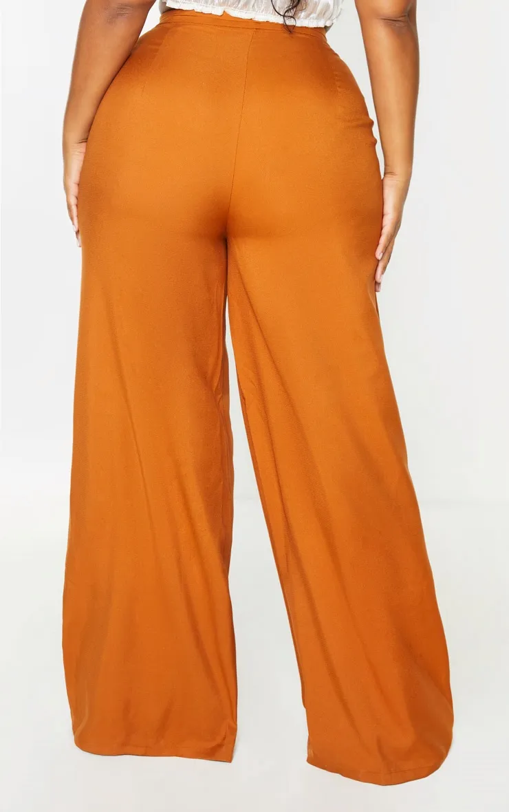 Plus Rust Pleat Detail Wide Leg Trousers sold by Pretty Little Thing product image thumbnail 4