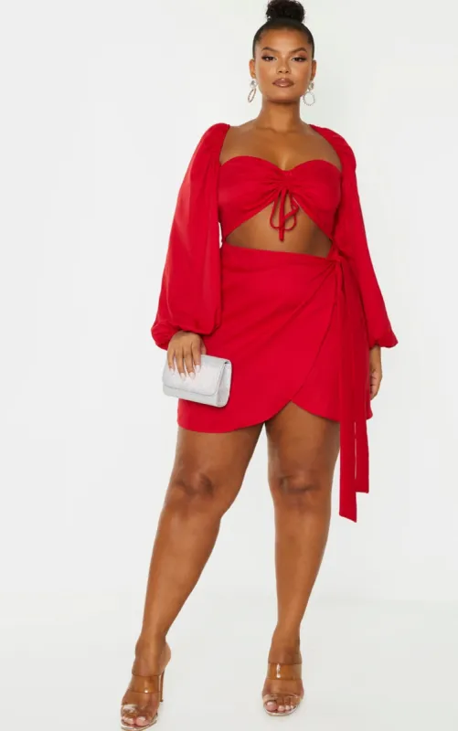 Plus Red Ruched Cut Out Bodycon Dress sold by Pretty Little Thing