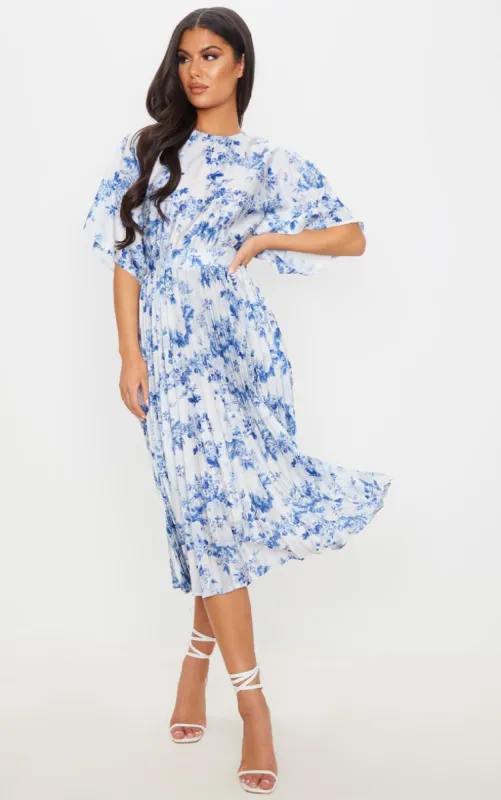 Pastel Blue Floral Print Open Back Pleated Midi Dress sold by Pretty Little Thing
