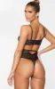 Black Underwired Cut Out Lace Body sold by Pretty Little Thing