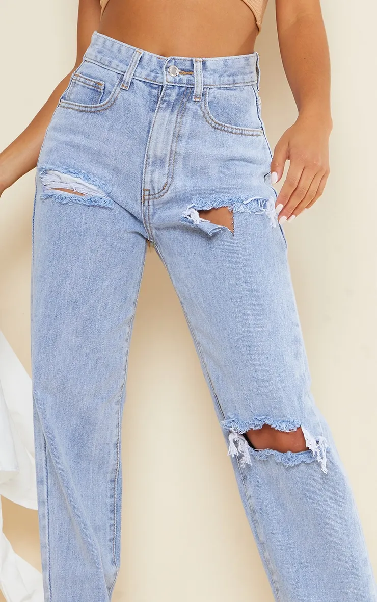 Petite Bleach Wash Ripped Split Hem Jeans sold by Pretty Little Thing product image thumbnail 4