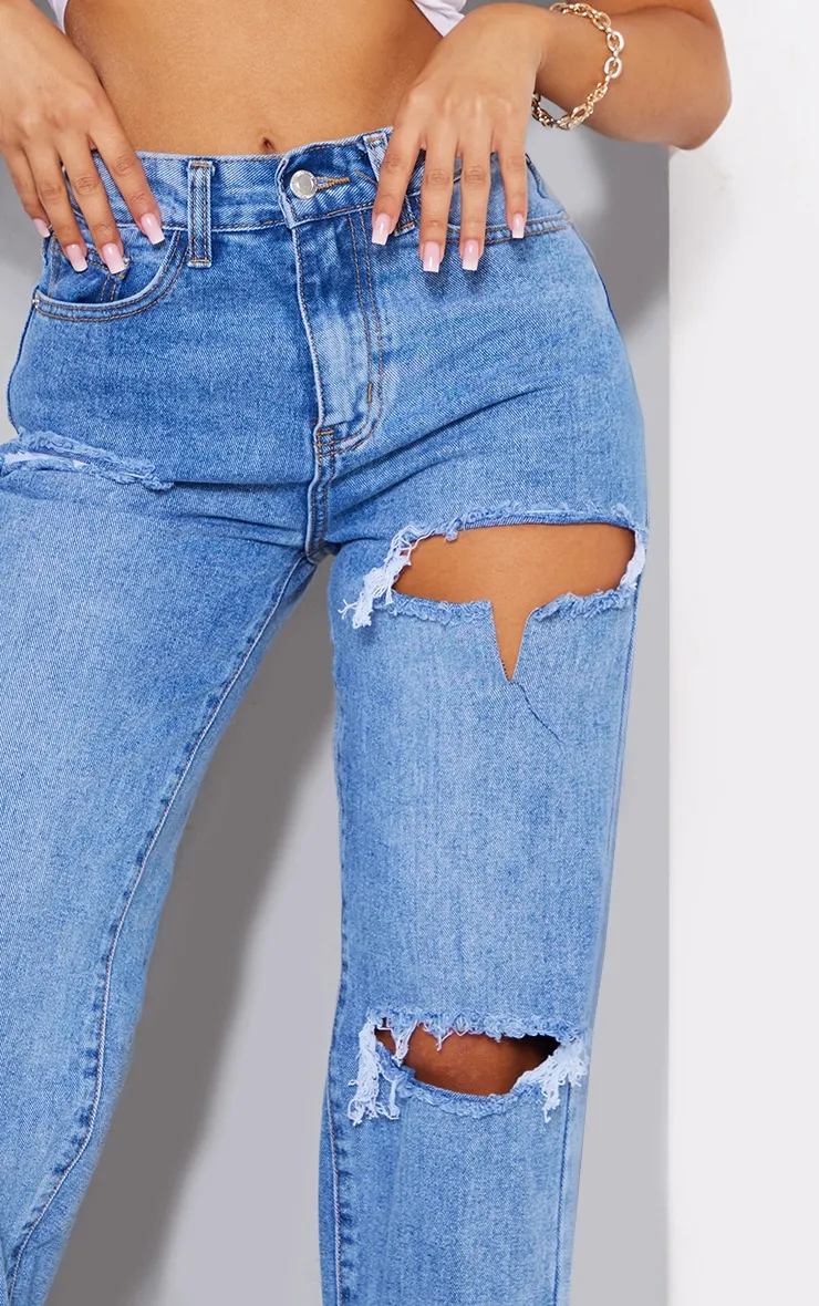 Petite Mid Blue Wash Ripped Split Hem Jeans sold by Pretty Little Thing product image thumbnail 4