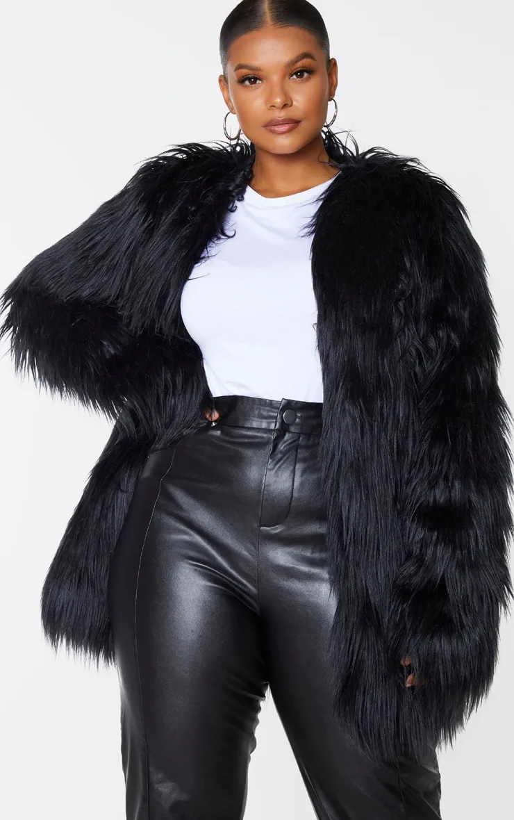 Plus Amaria Black Shaggy Faux Fur Jacket sold by Pretty Little Thing