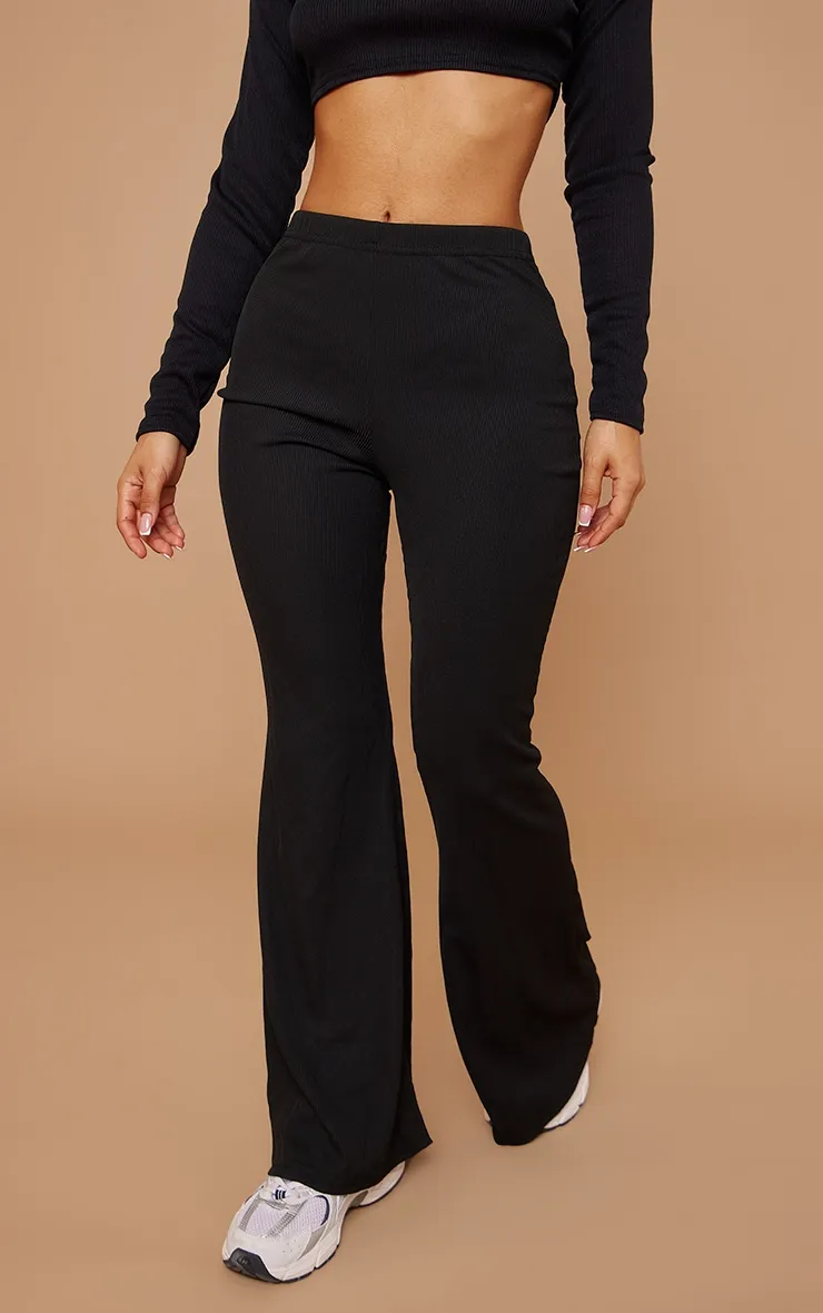 Petite Black Ribbed Flared Trousers sold by Pretty Little Thing product image thumbnail 2