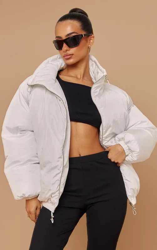 Petite White Extreme Oversized Puffer Jacket sold by Pretty Little Thing