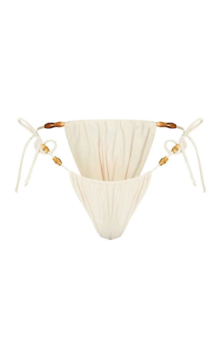 Sand Wooden Bead Ruched Tanga Tie Side Bikini Bottoms sold by Pretty Little Thing product image thumbnail 5