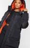 Plus Black Maxi Contrast Hooded Puffer Jacket sold by Pretty Little Thing