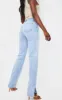 Tall Light Blue Wash Ripped Split Hem Straight Leg Jeans sold by Pretty Little Thing