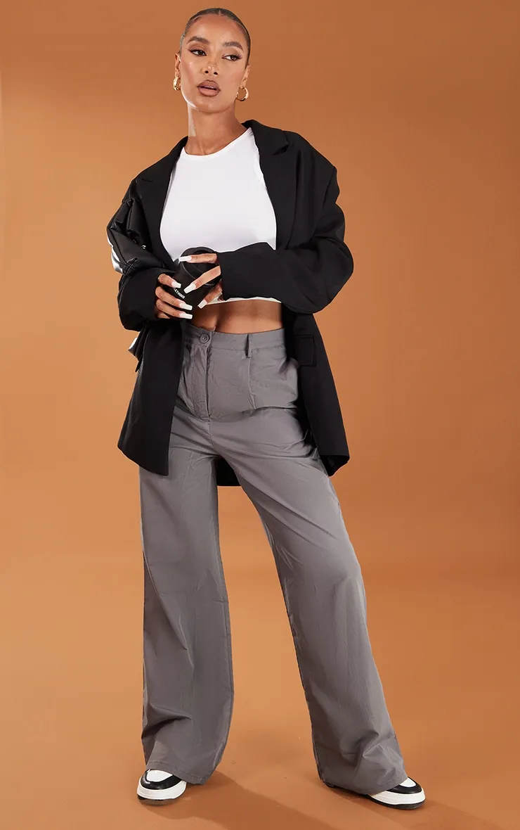 Charcoal Peach Skin Straight Leg Trousers sold by Pretty Little Thing