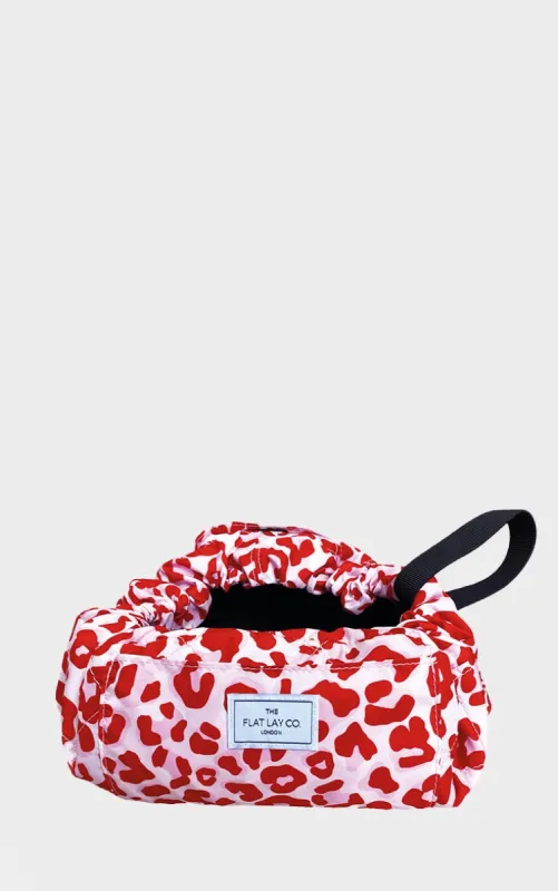 The Flat Lay co Makeup Bag Pink Leopard Print sold by Pretty Little Thing