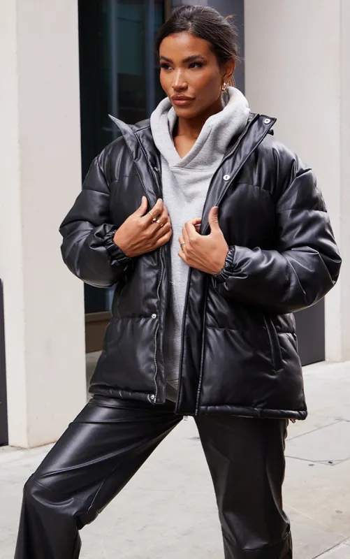 Black Faux Leather Oversized Pocket Front Hooded Midi Puffer sold by Pretty Little Thing